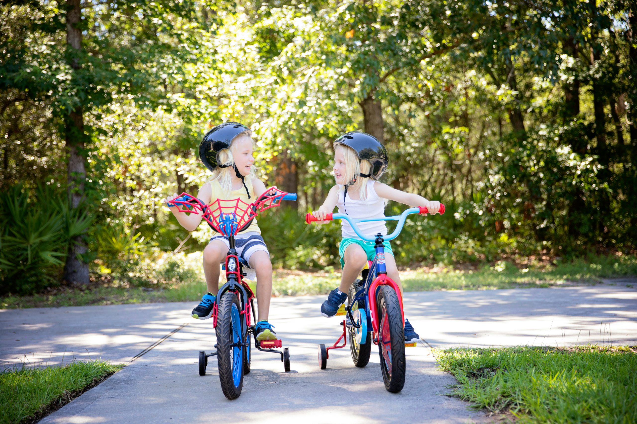 Children enjoying a summer bike ride outdoors
